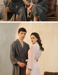 Detail of waffle weave texture on couple's lightweight summer bathrobes in grey and pink