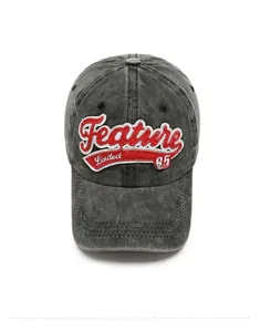 Close-up of vintage washed grey cotton baseball cap with red 3D letter embroidery