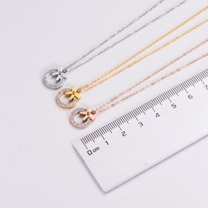 Detailed comparison of 1.5cm bow necklaces in silver, gold, and rose gold plating