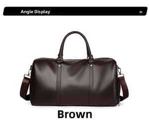Detail view of brown leather travel duffel bag with dual handles and fabric shoulder strap