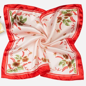 Elegant square floral silk scarf with red border and cream botanical pattern print