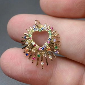 Exquisite gold heart pendant with colorful zircon tree of life and radiant sun design