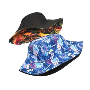 Reversible bucket hat set with tropical pineapple and toucan prints for sun protection