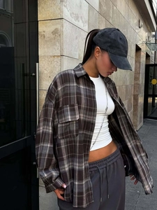 Oversized brown plaid flannel shirt for women with long sleeves and front pockets