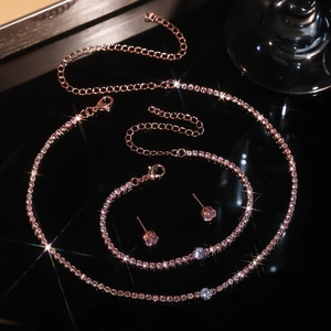 Rose gold jewelry set with round cubic zirconia necklace bracelet and stud earrings