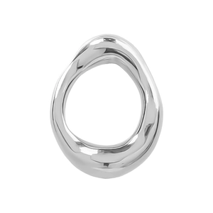 Macro shot of polished silver 304 stainless steel oval charm with smooth reflective surface