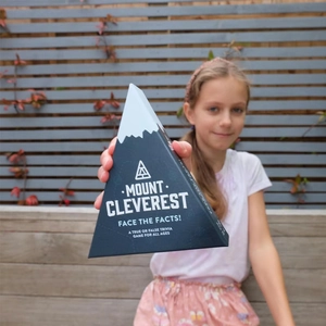 Mount Cleverest true or false trivia game in pyramid box held by hands outdoors