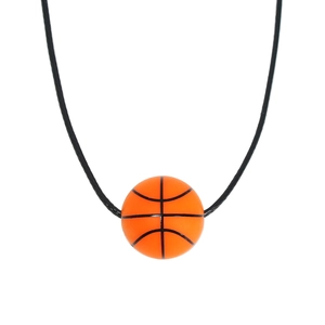 Close-up of orange basketball pendant with black lines on an adjustable black cord