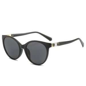 Women's black cat-eye sunglasses with luxury hexagonal scale metal hinge accents
