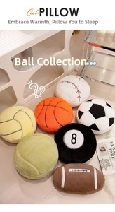 Macro shot of assorted plush sports ball pillows including basketball, soccer and baseball