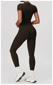 Detail of dark brown quick-dry yoga set featuring high-elasticity matte fabric