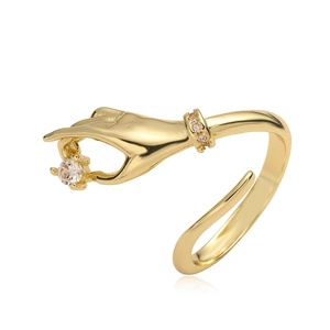 18K gold plated copper hand-shaped ring featuring a sparkling zircon stone in a unique design