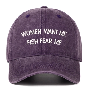 Close-up of vintage washed purple baseball cap with Women Want Me Fish Fear Me embroidery
