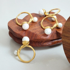 French style gold twist ring featuring elegant colorful pearls with adjustable open design