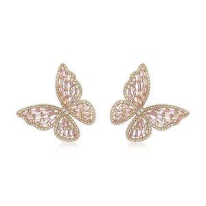 Macro detail of butterfly stud earrings featuring pink zircon and rose gold plating