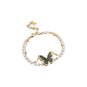 French vintage double-strand pearl bracelet with gold butterfly pendant and crystals
