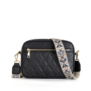 Black quilted crossbody camera bag with colorful ethnic embroidered wide strap and gold hardware
