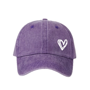 Vintage washed purple denim baseball cap featuring white heart embroidery and curved brim