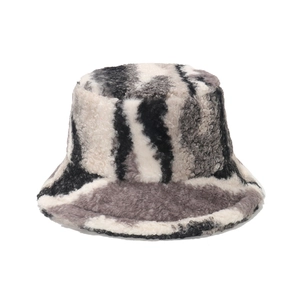 Winter plush bucket hat with black and white marble pattern in warm faux fur fabric