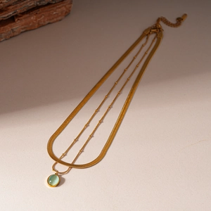 Collier double couche doré chaîne serpent avec pendentif en pierre oeil de chat