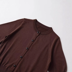 Chocolate brown crew neck knit cardigan with round buttons and ribbed texture finish