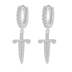 Detailed view of silver dagger earrings with full cubic zirconia micro-pave setting