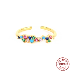 Polished S925 sterling silver open ring with colorful zircon stones on white background