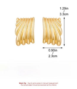 Detailed view of golden ripple earrings with 3.3cm height and 2.3cm width dimensions
