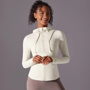 Detail of slim fit hooded sports jacket with zipper closure and textured drawstrings