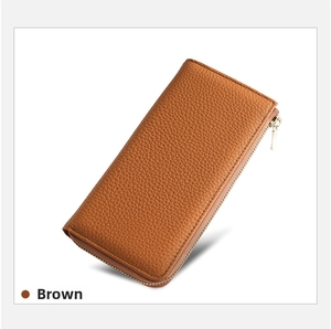Detailed close-up of brown pebbled leather texture on long RFID zipper wallet