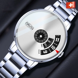 Macro view of silver stainless steel rotating disk dial on quartz watch for men