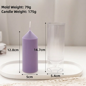 Vertical ribbed pillar candle plastic mold with a purple candle for DIY scented candles