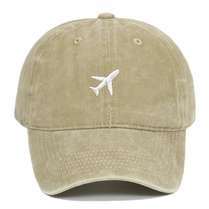 Vintage khaki washed cotton baseball cap featuring minimalist airplane embroidery