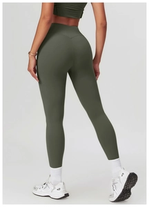 Rear view of high-waisted olive green yoga pants featuring butt-lifting effect and slim fit
