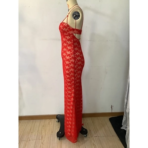 Detail view of red lace long dress featuring cut-out back and elegant fishtail silhouette