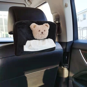 Black velvet car seat headrest tissue holder featuring a cute beige plush bear charm