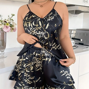 Women's black floral satin pajama set with camisole and ruffled shorts for summer comfort