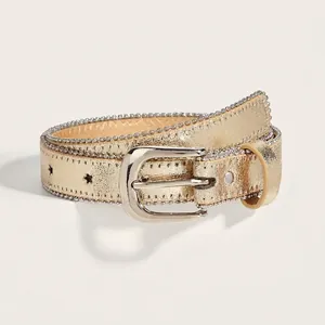 Close-up of golden belt with star cutouts, silver bead trim, and a polished buckle