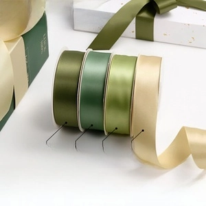 Detail of 9mm velvet ribbons in olive, bamboo, grass green and cream for DIY crafts