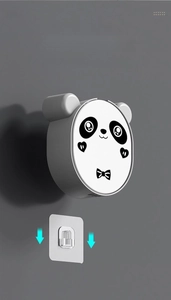 Detail of wall-mounted panda soap box with adhesive hook for drill-free installation