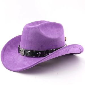 Detail of purple faux suede cowboy hat featuring a black band and gold lion head emblem