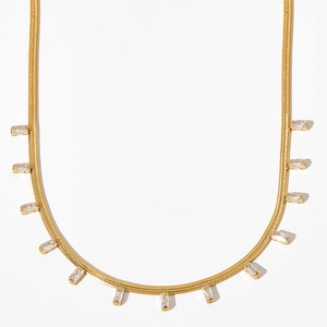 Exquisite gold snake chain necklace with rectangular zircon tassels on white background