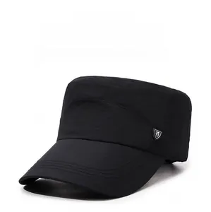 Detail view of quick-dry black flat top military cap with silver metallic M shield logo