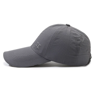 Dark grey quick-dry baseball cap with long visor and silver metal M letter logo