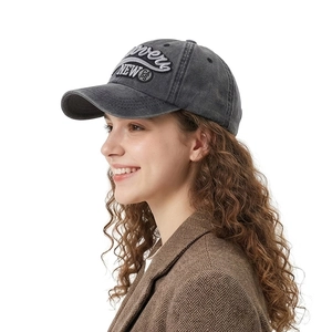Dark gray washed cotton baseball cap with 3D embroidery on a side profile view