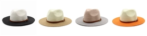 Détail de quatre chapeaux Fedora bicolores avec rubans en cuir et boucles dorées