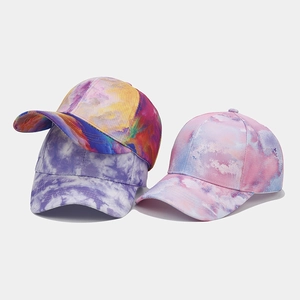 Detailed view of colorful tie-dye patterns on high-quality twill cotton baseball caps