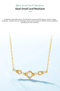 Close-up of S925 silver gold-plated necklace with opal stones and leaf leaf details