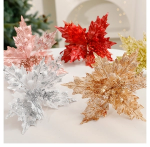 Sparkling artificial poinsettias with sequins for festive Christmas tree decor