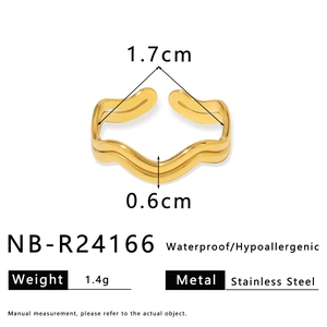 Macro detail of gold wavy stainless steel ring with 1.7cm diameter size measurement